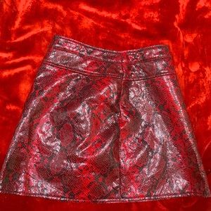 Red faux snakeskin skirt